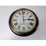 An early 20th century circular wall timepiece, later signed Walton,