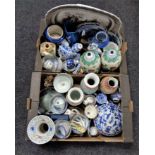 Two boxes of Oriental wares, vases, rice bowls and spoons,