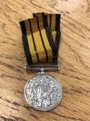 An Ashantee Medal with clasp Coomassie (possibly a copy) CONDITION REPORT: This