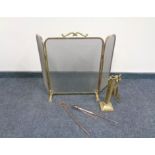 A brass framed three-way folding spark guard together with a part brass companion set and further