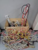 A box containing a large quantity of electric Christmas rope light displays.