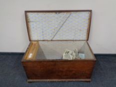 An antique pine blanket chest.