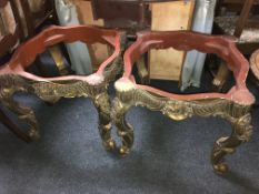 A pair of ornate gilt and gesso table bases