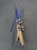 Two Safina two piece spinning rods with reels, together with four further part rods.