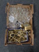 A box containing assorted liqueur glasses, liqueur decanter, brass picture frame easels,