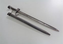 A WWI bayonet in metal scabbard