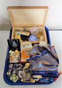 A tray of jewellery box, costume jewellery and small quantity of silk scarves.