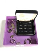 A box containing a quantity of silver jewellery to include rings, earrings, pendant,