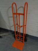 A heavy duty twin handled sack barrow with spring axle