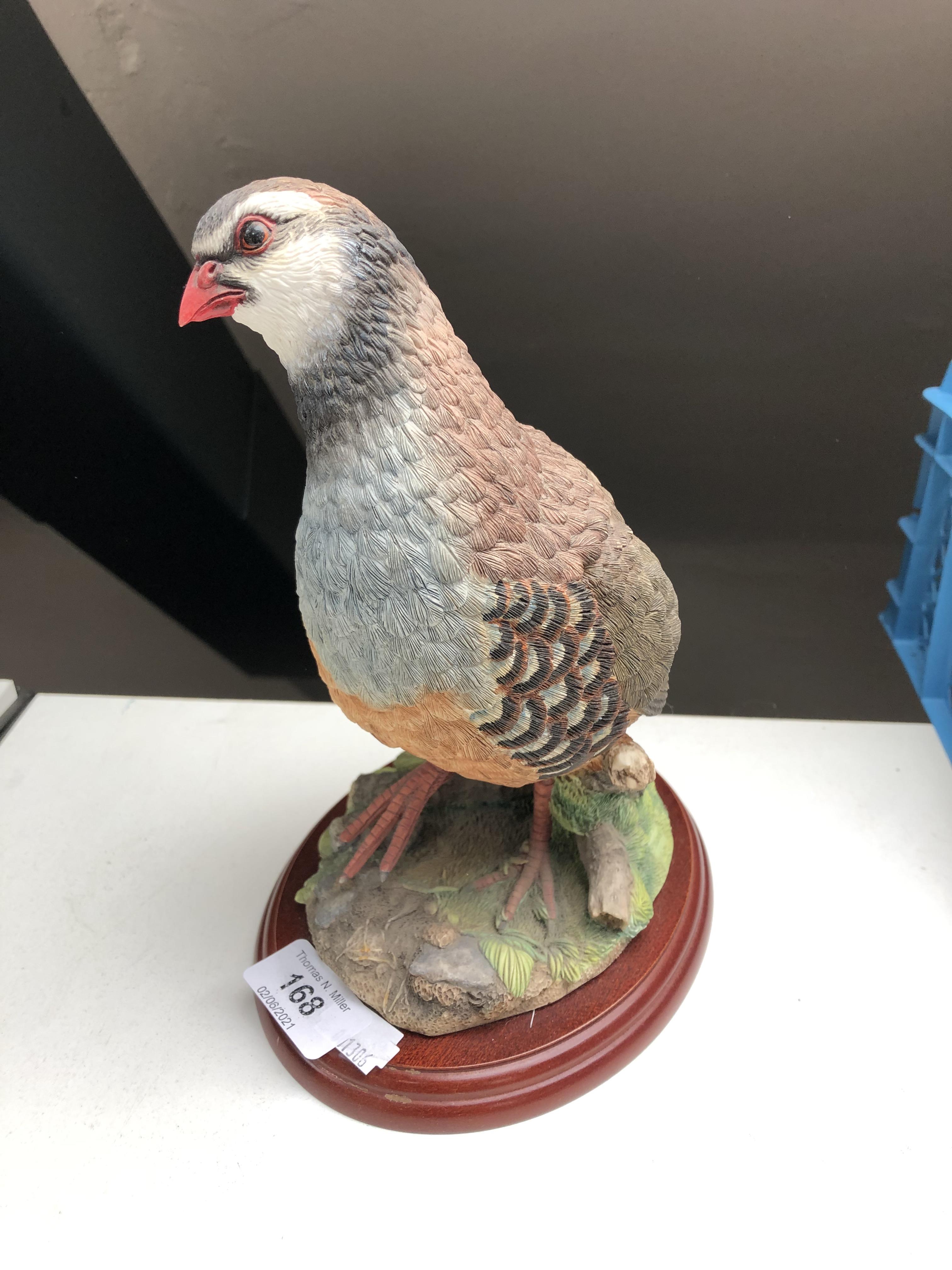 A Border Fine Arts figure, Partridge A0660 by Russell Willis, on wooden stand.