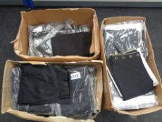 Three boxes containing Look Fashion and Images black trousers.