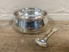 A silver shallow sugar bowl together with a mustard spoon, 115.7g.