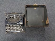 A vintage Remington home portable typewriter in case