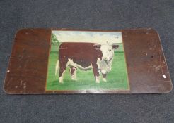 A hand painted picture of a bull of board by H.J.