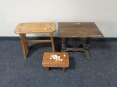 A pine stool together with a pine footstool,