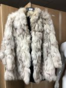 An Arctic fox fur coat.