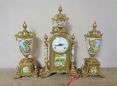 A three piece Imperial clock garniture set with Franz Hermle movement.