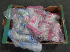 A box containing Peppa Pig and George Pig wellies.