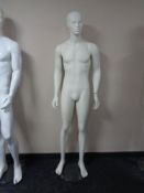 A male mannequin on stand (white matte).