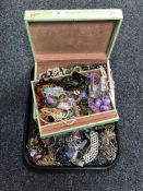 A tray containing a large quantity of assorted costume jewellery.