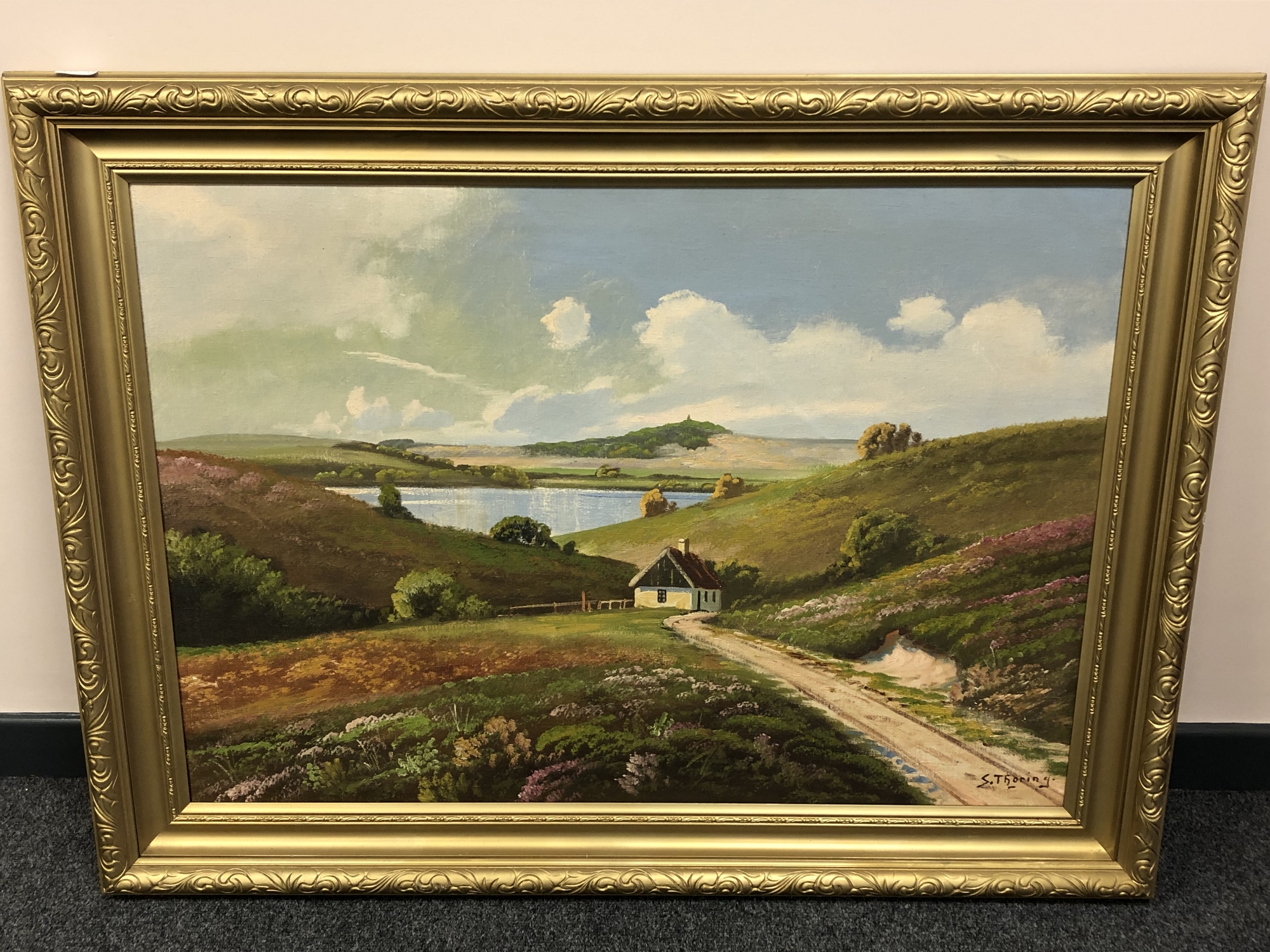 Continental school : A cottage in a landscape, oil on canvas, 94 x 66 cm, framed.