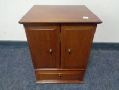 An antique mahogany double door table topped cabinet (no interior)