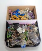 A tray containing a large quantity of assorted costume jewellery.