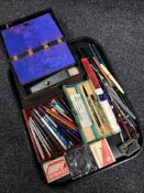 A tray containing a 20th century portable writing box, large quantity of assorted pens, pen nibs,