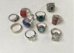 Ten assorted silver dress rings.