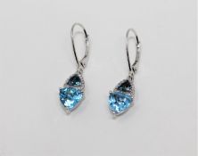 A pair of 10ct white gold blue topaz and diamond drop earrings,