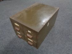 A mid 20th century steel four drawer desk top index chest.