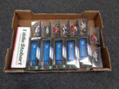 A box containing boxed trucks to include an Atlas editions Eddie Stobart 5 Cararama Knights of Old