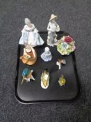 A tray containing china figurines to include Royal Doulton Southern Belle HN2425,