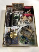 A box containing miscellaneous items to include vintage gilt rimmed spectacles, marbles,