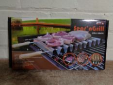 A box of 46 boxed Arrow Sear N Grill grates