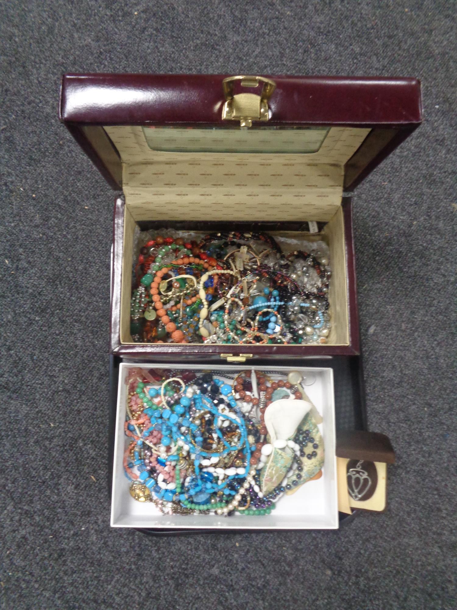 A tray containing jewellery box together with a quantity of assorted costume jewellery.