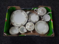 A box containing a Japanese tea and dinner service.