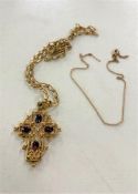 A costume pendant on 9ct gold chain together with a 9ct gold trace chain (broken).