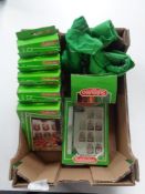A box containing Subbuteo teams, accessories and pitch.