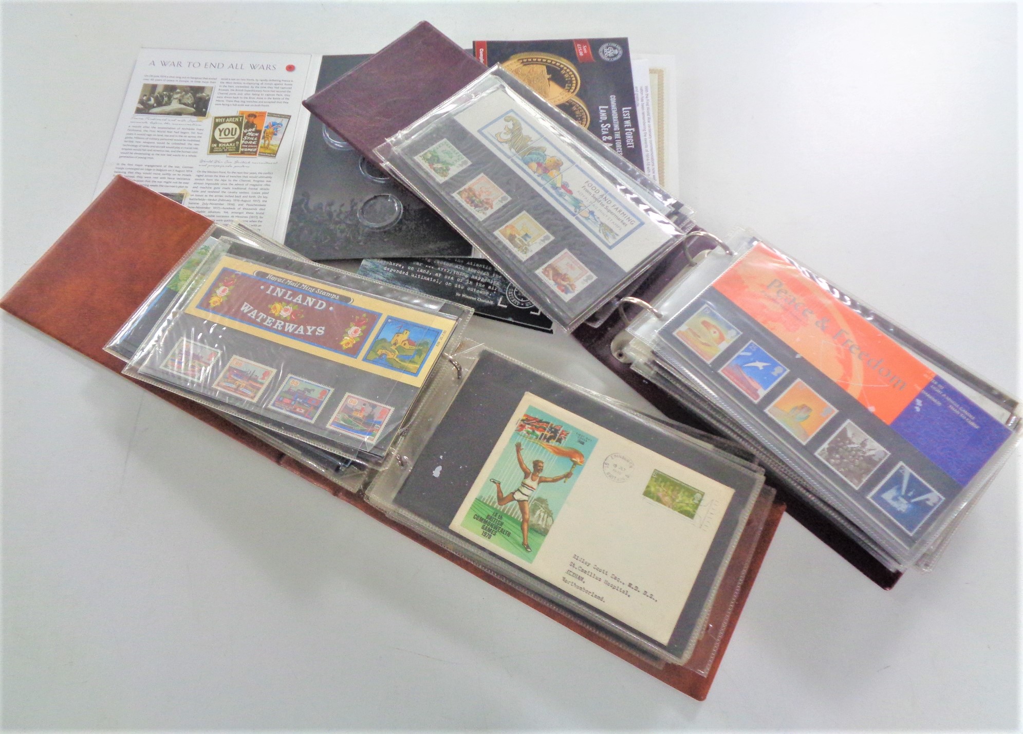 Two albums of first day covers together with two part-coin collection issues.