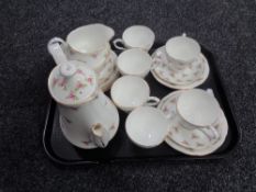 A tray containing a 21 piece Duchess pink rose pattern bone china tea service.