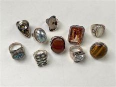 Ten assorted silver dress rings.