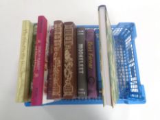 A basket containing ten Folio Society volumes to include Robert Louis Stevenson,