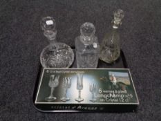 A tray containing a boxed set of Crystal D' Arques glasses together with three decanters.