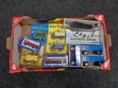 A box containing boxed die cast vehicles to include Base Toys delivery vans, ERTL wagons etc.