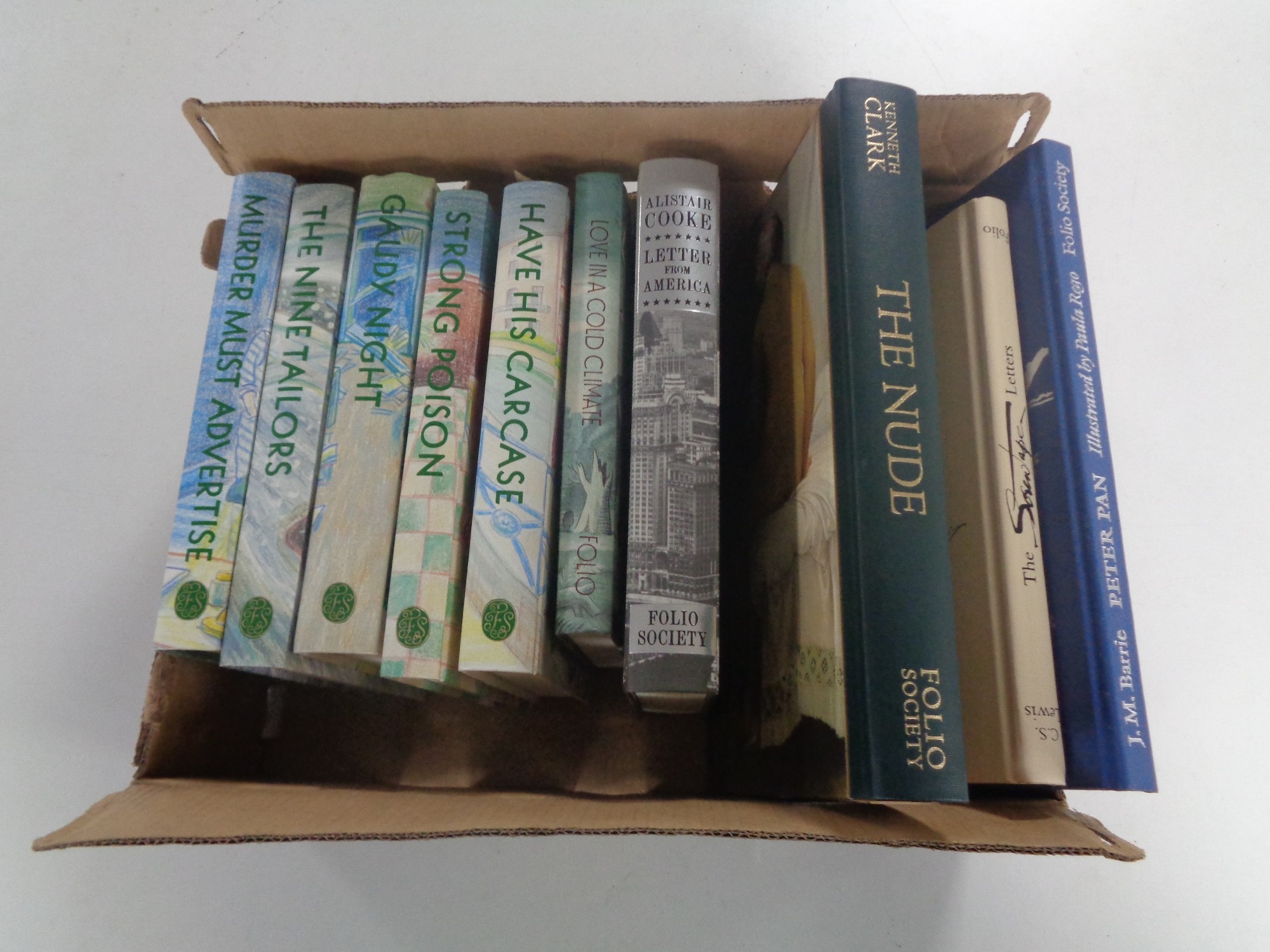 A box containing ten Folio Society volumes to include Alistair Cook Letter from America,