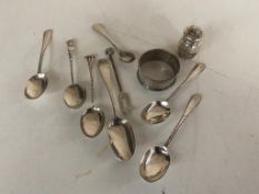 A small collection of silver items to include - posie vase, two pairs of squatt candlesticks,