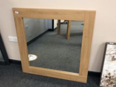 A 3' by 3' oak mirror