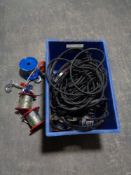 A crate of steel winch cables and rubber drive belts