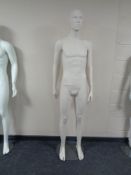 A male mannequin on stand (flesh matte).